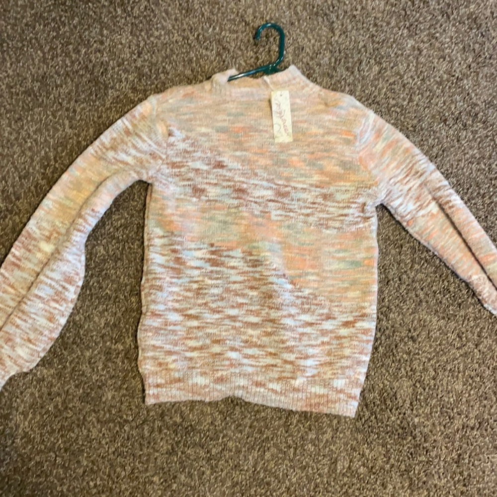 mystery brand. Size large it’s a sweater